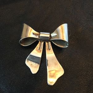 Silvertone bow pin brooch